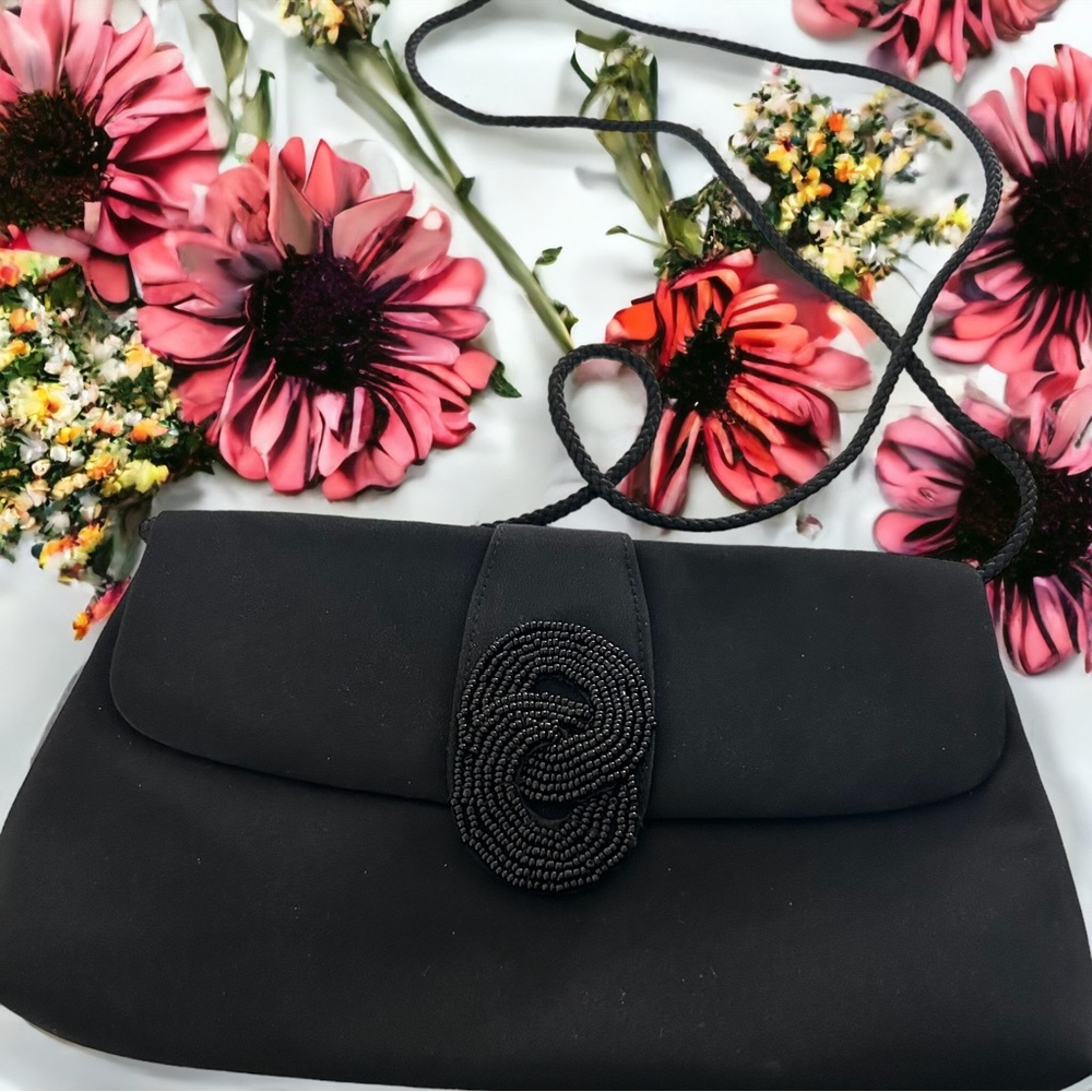 Evening bag; black beaded design on the front flap.